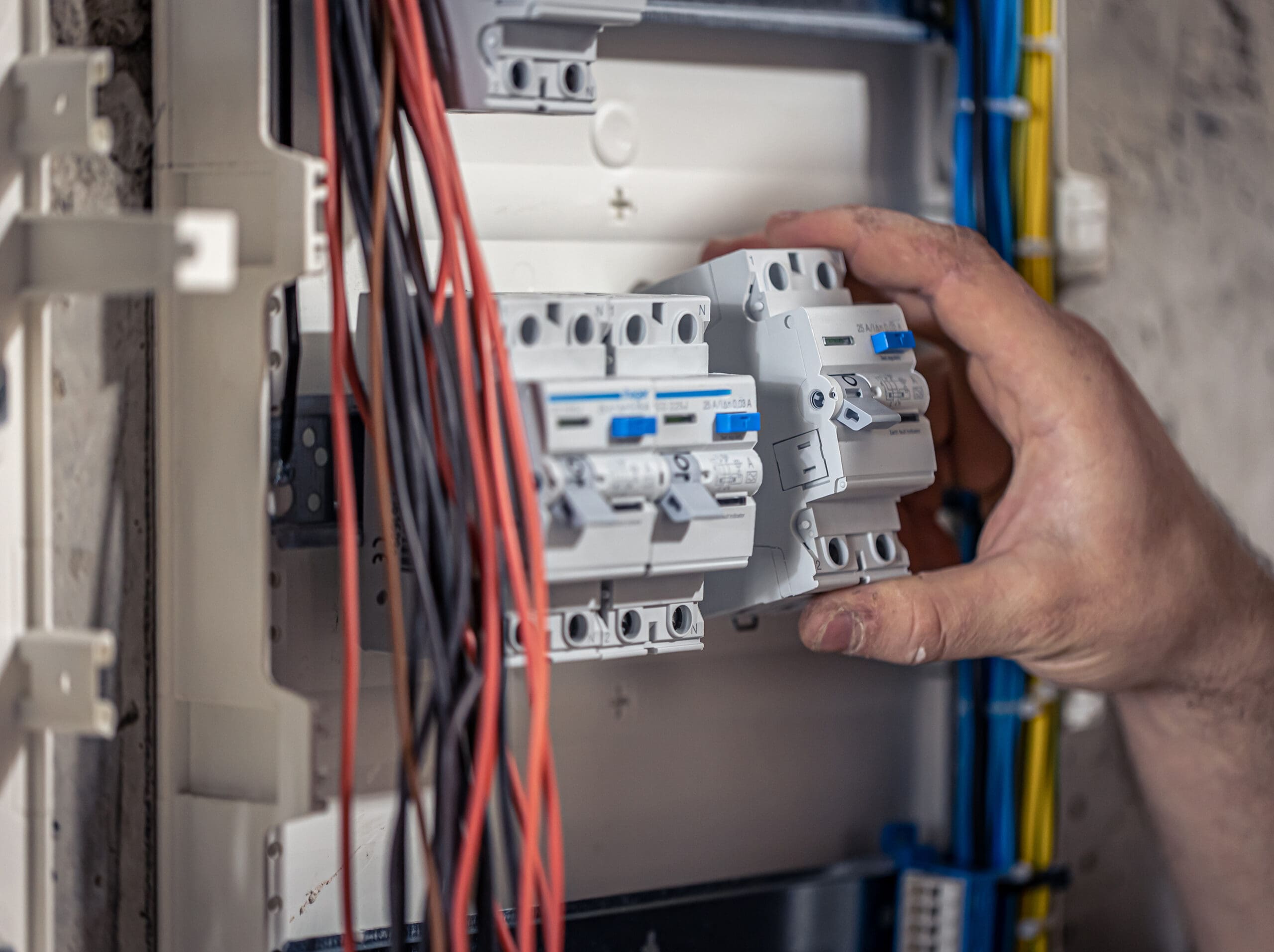 man's hand on switchboard attempting to upgrade